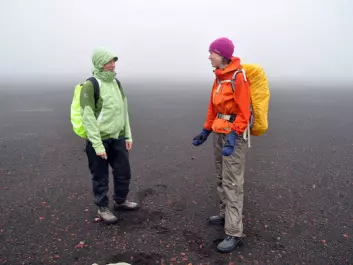 Elisabeth Maquart and Brooke Wilkerson on Jan Mayen. The island is nearly always shrouded in fog and sometimes Jutta Kapfer and her two assistants walked kilometres without finding the plants they sought. (Photo: Jutta Kapfer)