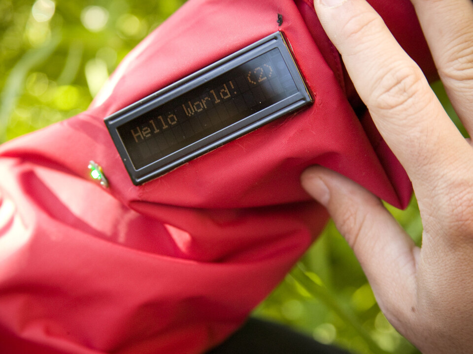 Instead of a telephone display, the jacket sleeve has a display sewn into it, showing a line of rolling text. (Photo: Gry Karin Stimo)