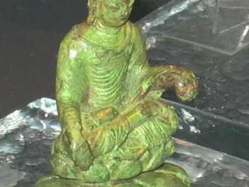 A Buddha statue from the 500s AD, found on the island lake of Helgö in Sweden (Photo: Berig/Wikimedia Commons)