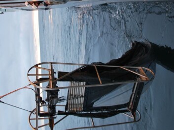 Scientists pay close attention while this MOCNESS plankton net is lowered into the sea. The net takes nine different plankton samples – one all the way down the column of water from the surface to 1,000 metres, and eight from various depths on the way up. (Photo: Hanne Østli Jakobsen) Scientists pay close attention while this MOCNESS plankton net is lowered into the sea. The net takes nine different plankton samples – one all the way down the column of water from the surface to 1,000 metres, and eight from various depths on the way up. (Photo: Hanne Østli Jakobsen)
