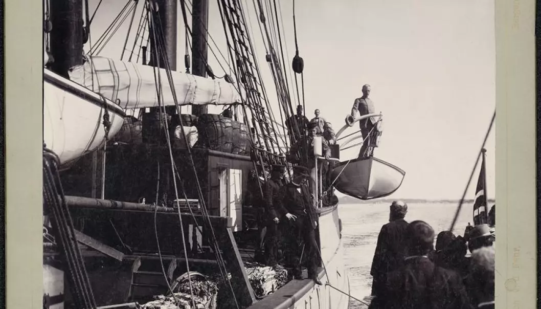 Nansen stands on one of the Fram's lifeboats as the vessel heads north from Bergen, at the beginning of its 3-year-long journey to study the mysteries of the Arctic Ocean. (Photo: Joh v. d. Fehr / from the Norwegian National Library, bldsa_q3c001)