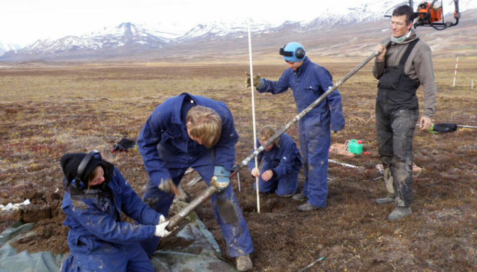 University of Copenhagen Professor Bo Elberling (right) and University Centre in Svalbard students collect core samples of permafrost at Zackenberg, in Northeastern Greenland. (Photo: Hanne C. Christiansen/UNIS)