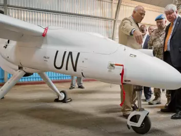 In December the UN started flying its first drones in the Eastern districts of the Democratic Republic of Congo. The head of the UN’s peacekeeping operations, Hervé Ladsous, is seen at right inspecting the un-piloted aircraft in the city of Goma. (Photo: Sylvain Liechti, Monusco)