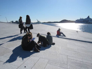 High school students working on a geoscience assignment on the sloping facade of Oslo’s Opera and Ballet, which is clad in white granite and Italian marble. (Photo: Kari Beate Remmen) High school students working on a geoscience assignment on the sloping facade of Oslo’s Opera and Ballet, which is clad in white granite and Italian marble. (Photo: Kari Beate Remmen)