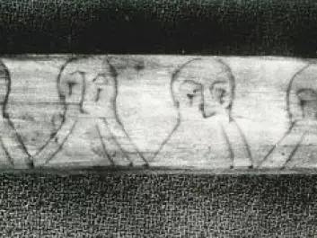 A rune stick from the Wharf in Bergen testifies to a mischievous use of runic writing. The lines in the beards of these men comprise a message, written in cipher runes. (Photo: Aslak Liestøl/ Museum of Cultural History, University of Oslo)