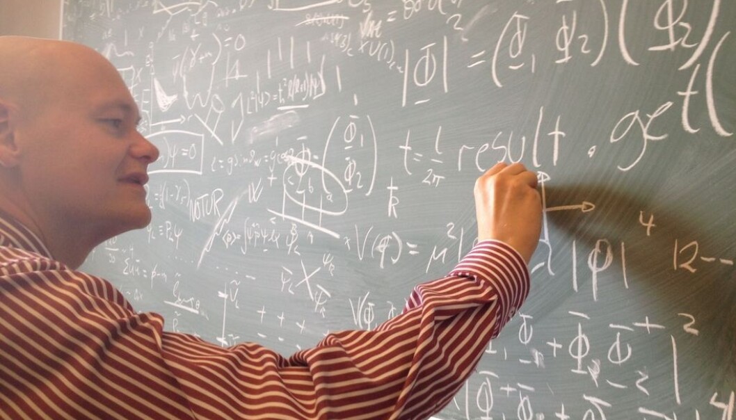 Professor Are Raklev of the University of Oslo’s Department of Physics, working out a weighty problem in his office. (Photo: Ingrid Spilde) Professor Are Raklev of the University of Oslo’s Department of Physics, working out a weighty problem in his office. (Photo: Ingrid Spilde)