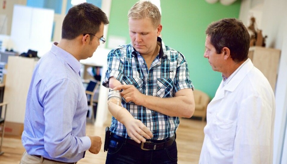 Max Ortiz Catalan (right) and Richard Brånemark with the first patient who received the bone-anchored prosthesis. (Photo: Ortiz-Catalan et al., Sci. Trans. Med., 2014)
