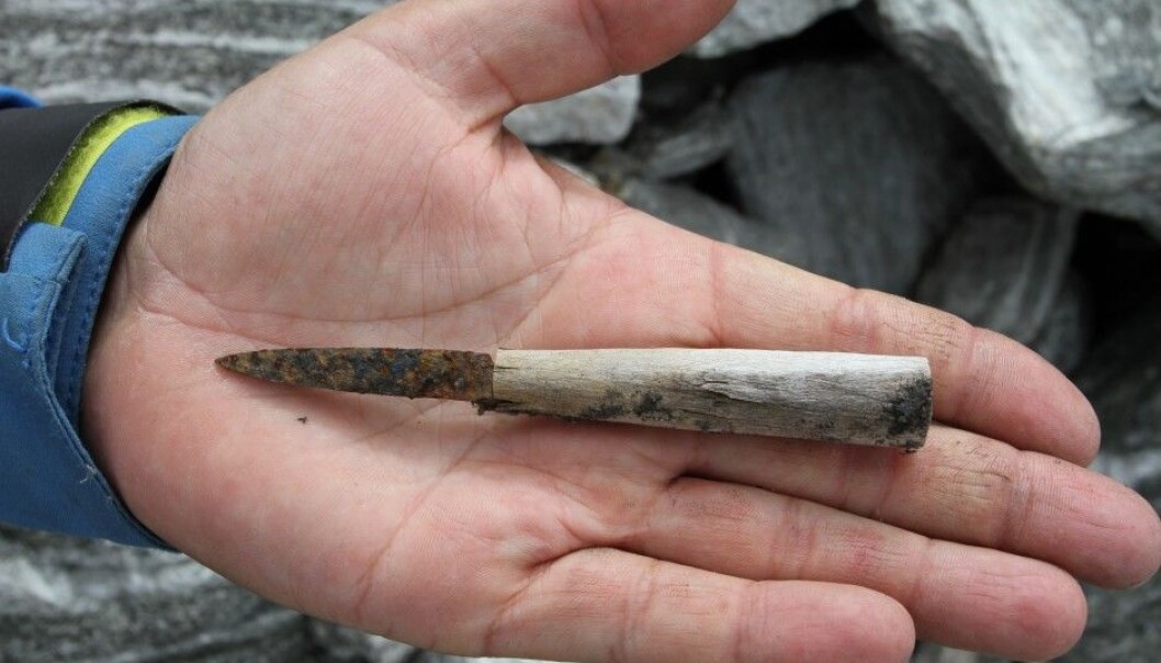 A small knife with a wooden handle, probably from the Iron Age, was one of the treasures found by archaeologists at the glacier Lendbreen in Oppland County, Norway during the 2014 summer season. (Photo: Oppland County) A small knife with a wooden handle, probably from the Iron Age, was one of the treasures found by archaeologists at the glacier Lendbreen in Oppland County, Norway during the 2014 summer season. (Photo: Oppland County)