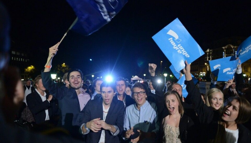 Norwegian youth have grown more politically active in the past few years. But they aren’t particularly radical. Here the Norwegian Young Conservatives celebrate outside the national assembly, the Storting, on the election night in 2013. (Photo: NTB scanpix)