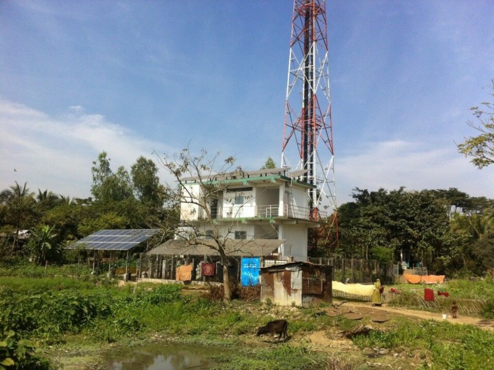 This mobile phone base station clad with photovoltaic solar cells supplied electricity to 136 households and two temples in the village, through a so-called mini-grid. (Photo: Hanne Cecilie Geirbo)