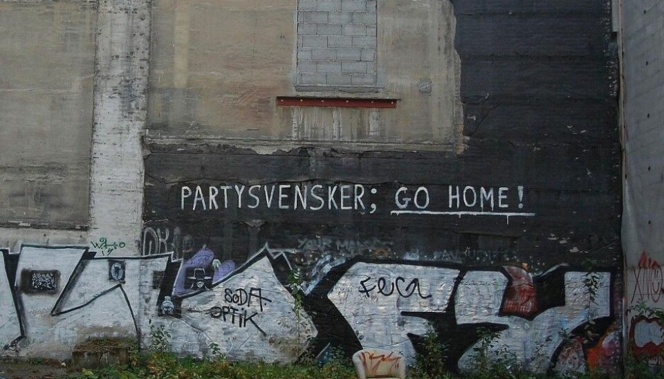 Party Swedes; go home! A clear message left for Swedes on an Oslo wall – but is it funny or racist? The graffiti was left untouched for three years. (Photo: Anne-Sophie Ofrim, made available from Wikimedia Commons under license)