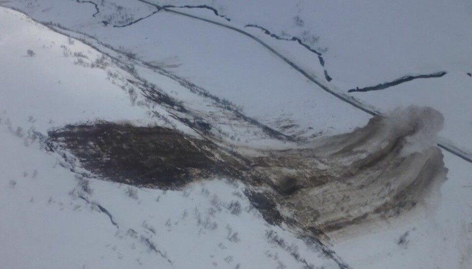The large glide avalanche that released in Kvassdalen, Norway on 8 April 2015. You can see the road at the bottom of the valley, and the avalanche was about 100 meters wide. Eight meters of snow ended up on the road. (Photo: NPRA)