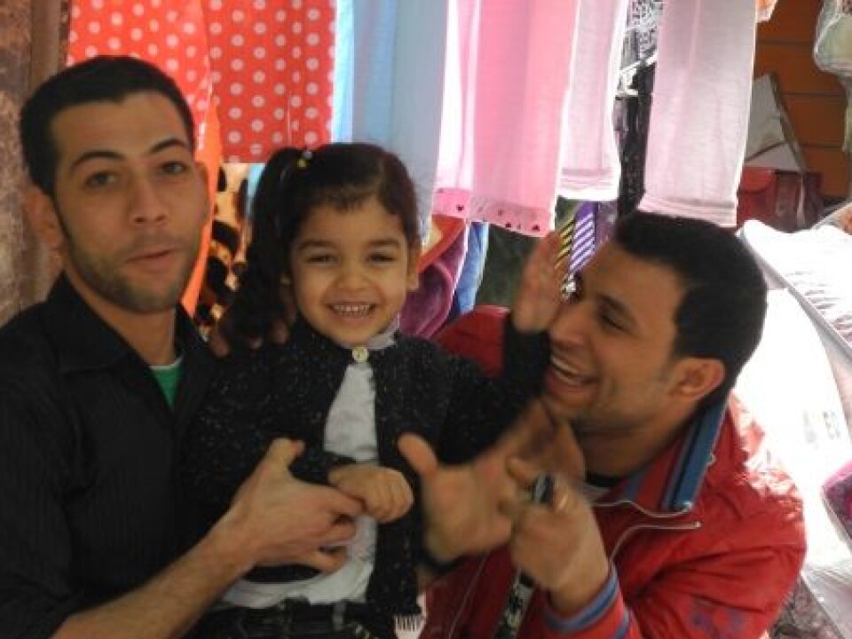 Two young men with their niece: Bighearted and lighted blooded. Cairo 2010. (Photo: Nefissa Naquib)