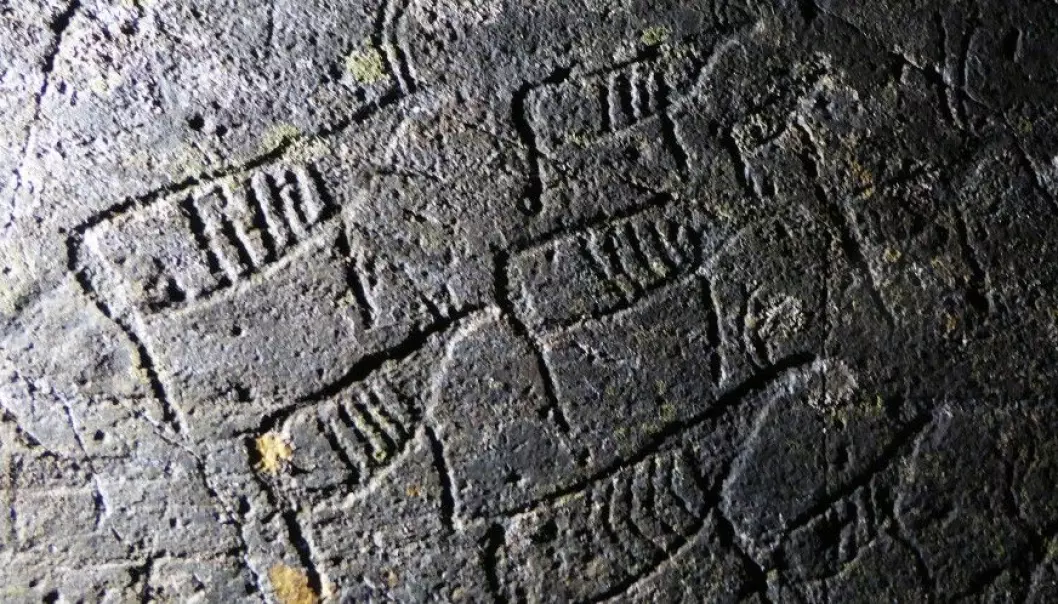 Forty-eight Stone Age petroglyphs include images of a reindeer herd, shown with all the animals moving in the same direction.  It’s possible that the artist was trying to say that reindeer migrated this way 7,000 years ago. (Photo: Jan Magne Gjerde, Tromsø Museum - The University Museum)