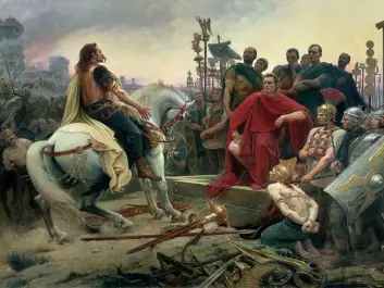 Julius Caesar wins the Gallic Wars, as portrayed by the French painter Lionel Royer. The mounted Gallic Chieftain Vercingetorix throws down his weapons and the feet of Julius Caesar. (Painting: Lionel Royer)