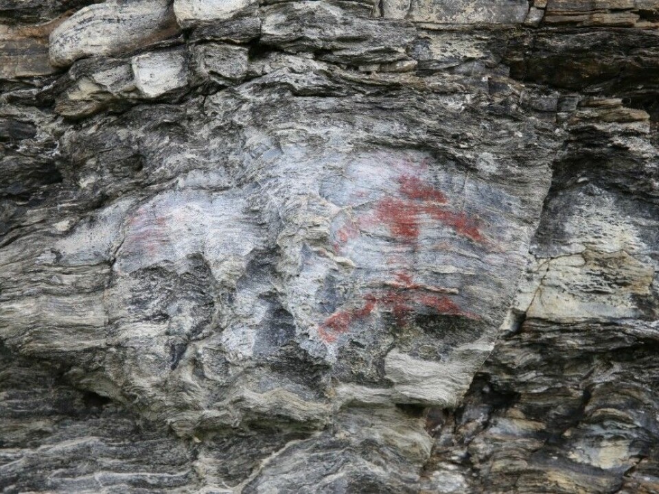 The male figure was painted with a mixture of ochre and fat. (Photo: UiT The Arctic University of Norway)