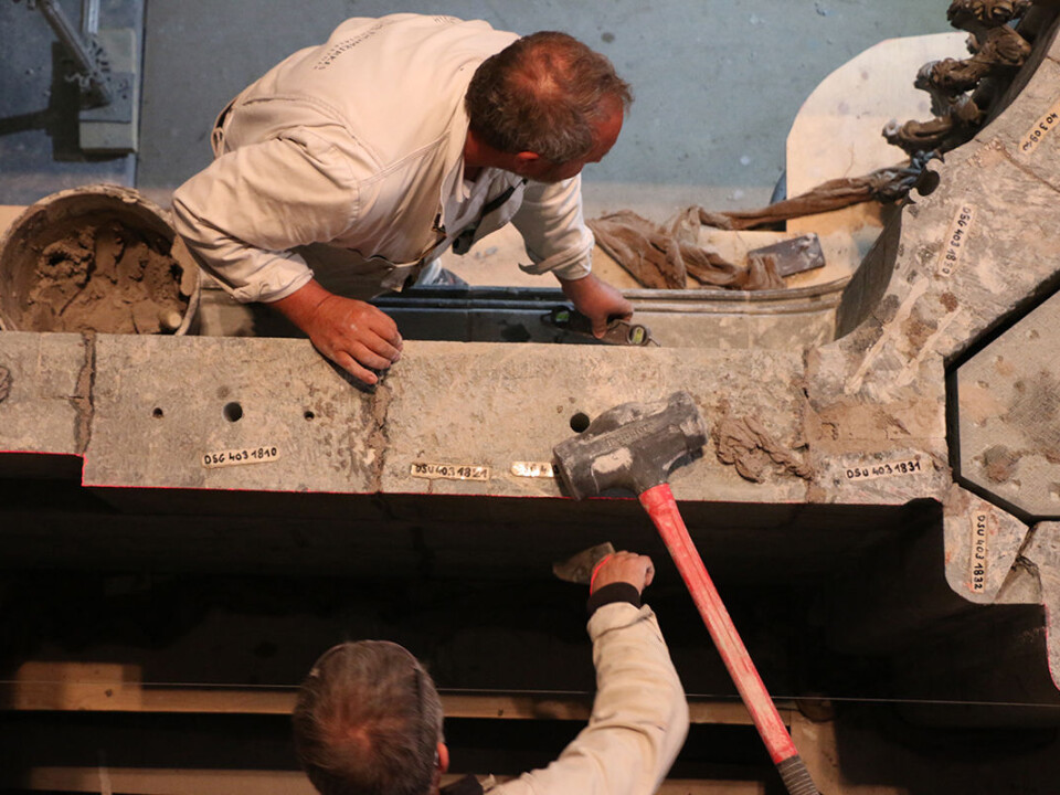 Nidaros Cathedral Restoration Workshop stonemasons Christopher Pennock (top) and Terje Gimnes (bottom) piece together part of the King’s Entrance as they rebuild the structure. The reconstruction is expected to be completed by 2019. Workers began disassembling the structure in 2012. (Photo: Nancy Bazilchuk, NTNU)