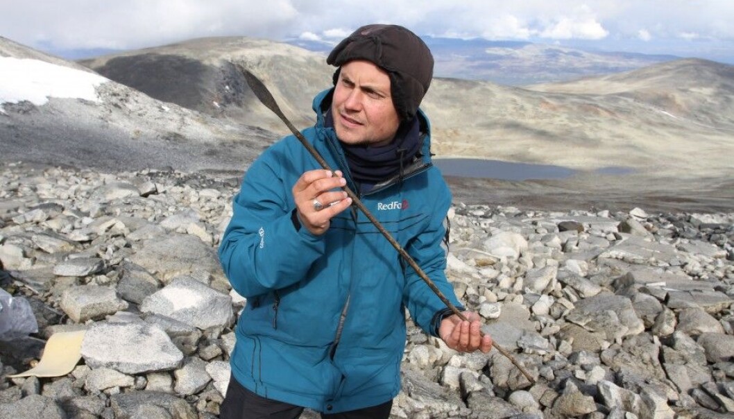 An archaeologist holds up an arrow, circa 1,400 years old, which was lost in a reindeer hunt in the mountains of Norway’s Oppland County during the Late Antique Little Ice Age. (Photo: Julian Martinsen, secretsoftheice.com/Oppland County) An archaeologist holds up an arrow, circa 1,400 years old, which was lost in a reindeer hunt in the mountains of Norway’s Oppland County during the Late Antique Little Ice Age. (Photo: Julian Martinsen, secretsoftheice.com/Oppland County)