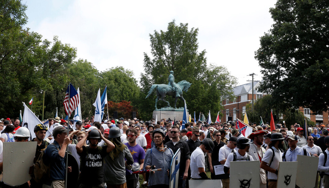 Neo-Nazis and far-right nationalists gathered to prevent the statue of Confederate Civil War General Robert E. Lee from being removed from Emancipation Park in Charlottesville, Virginia. The protests ended after a woman was killed and 19 people were injured when a right-wing extremist drove his car into a crowd. (Photo: Joshua Roberts / Reuters / NTB scanpix) Neo-Nazis and far-right nationalists gathered to prevent the statue of Confederate Civil War General Robert E. Lee from being removed from Emancipation Park in Charlottesville, Virginia. The protests ended after a woman was killed and 19 people were injured when a right-wing extremist drove his car into a crowd. (Photo: Joshua Roberts / Reuters / NTB scanpix)