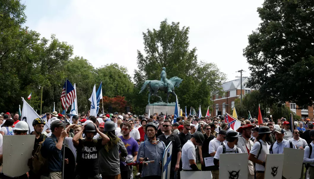 Neo-Nazis and far-right nationalists gathered to prevent the statue of Confederate Civil War General Robert E. Lee from being removed from Emancipation Park in Charlottesville, Virginia. The protests ended after a woman was killed and 19 people were injured when a right-wing extremist drove his car into a crowd. (Photo: Joshua Roberts / Reuters / NTB scanpix)