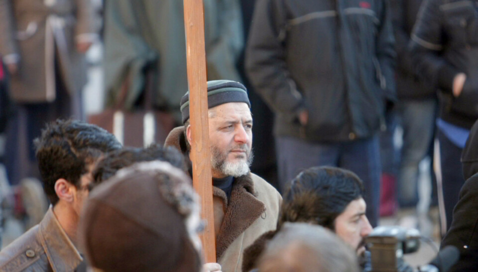 A Muslim clearly expresses his opinion about the Muhammad cartoons in a demonstration in Oslo. (Photo: Stian Lysberg Solum / Scanpix)