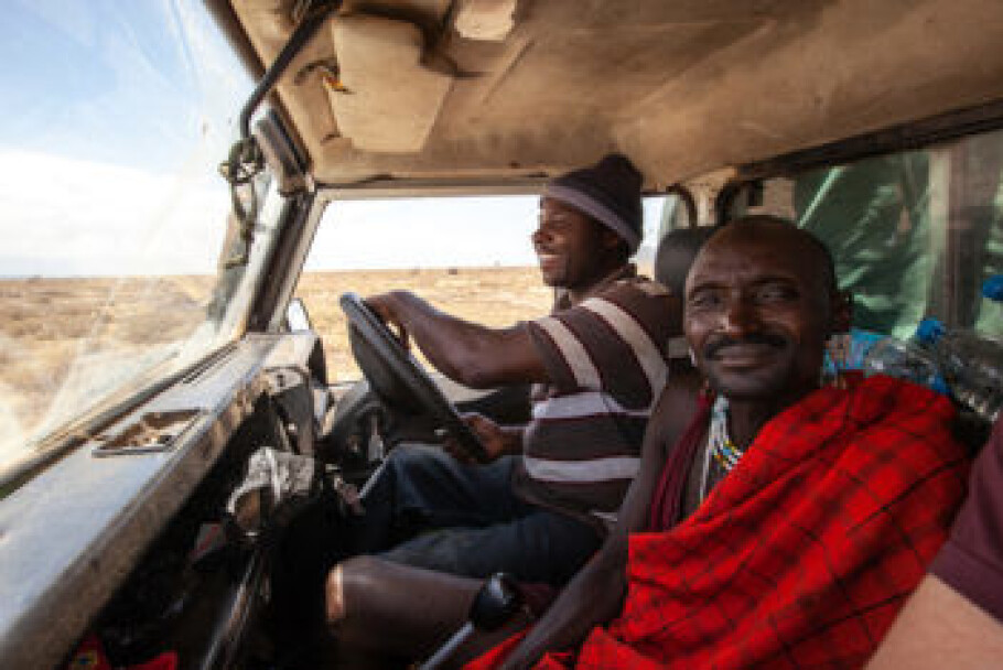 Onesmo, left, a driver and field technician on the African wild dog project, and a Maasi man out on the job. (Photo: Per Harald Olsen, NTNU)