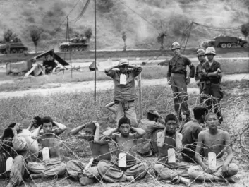 STATISTICAL DIVIDING LINE: The wars before the Korean War killed four times as many people as the wars that followed. In this photo U.S. Military Police guard North Korean soldiers, captured Sept. 4, 1950, at the Naktong river front line. (Photo: AP/ NTB scanpix)