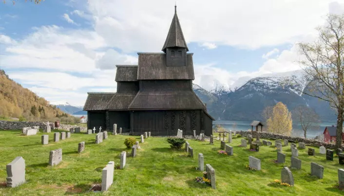 What do the animals in stave church ornamentation signify?