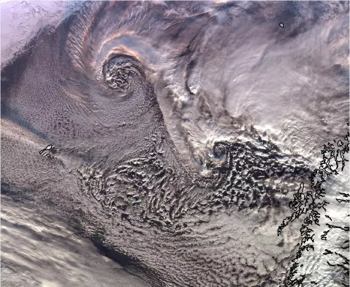 The white swirls in this satellite image are polar lows. (Photo: MET Norway)