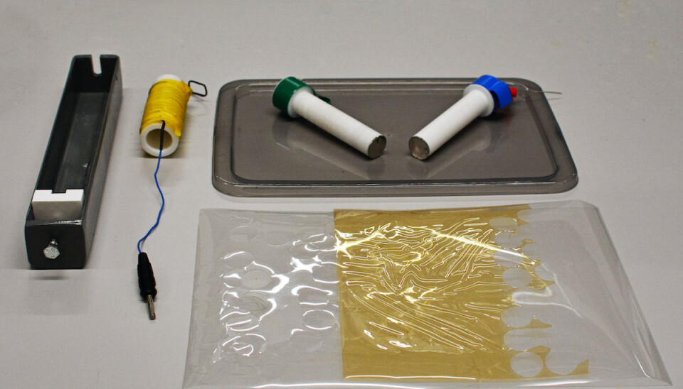 Here’s what it takes to make the cells. In the front of the picture is the ion exchange membrane, while in the back are the cell components used to measure the membrane conductivity. (Photo: Lars Robert Bang/NTNU)