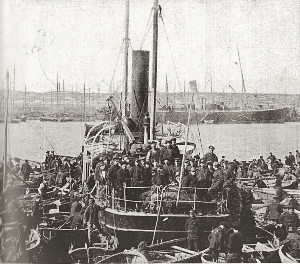 Picture from Vardø harbour in 1908. In the background the Russian passenger ship "Lomonosov" that travelled between Finnmark and Arkhangelsk during the summer. In the midst of the great emigration, when tens of thousands of Norwegians left for America in the west, some 200 to 300 Norwegians travelled east. Most of those who headed for the sparsely populated Murmansk coast (Russian for "Norwegian coast") were from the counties Finnmark and Troms, but some came from further south as well. Picture from Vardø harbour in 1908. In the background the Russian passenger ship "Lomonosov" that travelled between Finnmark and Arkhangelsk during the summer. In the midst of the great emigration, when tens of thousands of Norwegians left for America in the west, some 200 to 300 Norwegians travelled east. Most of those who headed for the sparsely populated Murmansk coast (Russian for "Norwegian coast") were from the counties Finnmark and Troms, but some came from further south as well.