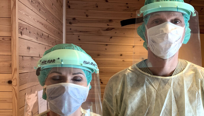Health care personnel try on a prototype of the new face shield. Health care personnel try on a prototype of the new face shield.