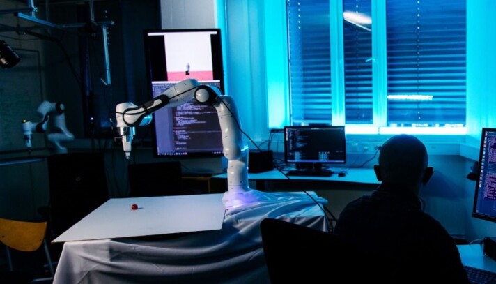 Ekrem Misimi in the lab, where the robot is about to grasp a cherry tomato that it has never seen before. Ekrem Misimi in the lab, where the robot is about to grasp a cherry tomato that it has never seen before.