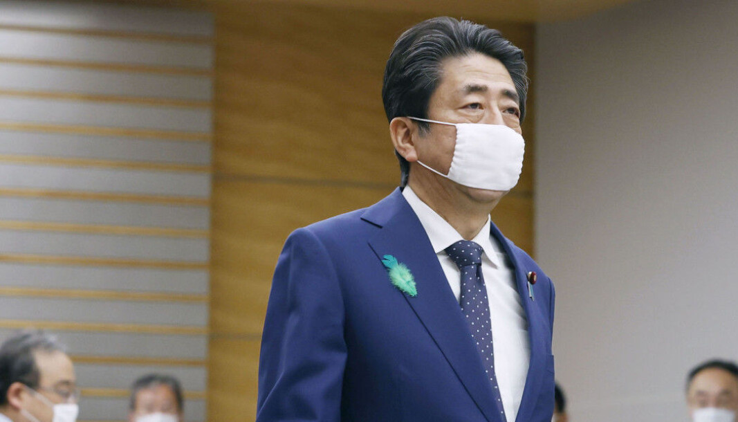 Japanese prime minister Shinzo Abe wearing a face mask. Using face masks in Japan and China started with the Spanish flu, but continued after the outbreak was over. Japanese prime minister Shinzo Abe wearing a face mask. Using face masks in Japan and China started with the Spanish flu, but continued after the outbreak was over.