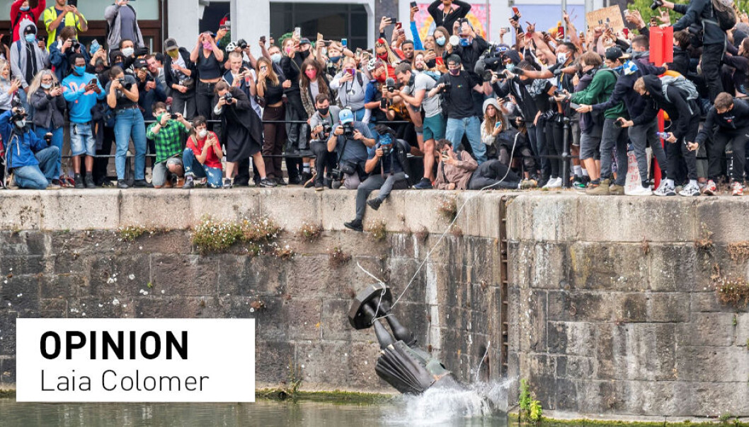 The statue of 17th century slave trader Edward Colston falls into the water after protesters pulled it down and pushed into the docks in Bristol, Britain, June 7, 2020. The statue of 17th century slave trader Edward Colston falls into the water after protesters pulled it down and pushed into the docks in Bristol, Britain, June 7, 2020.
