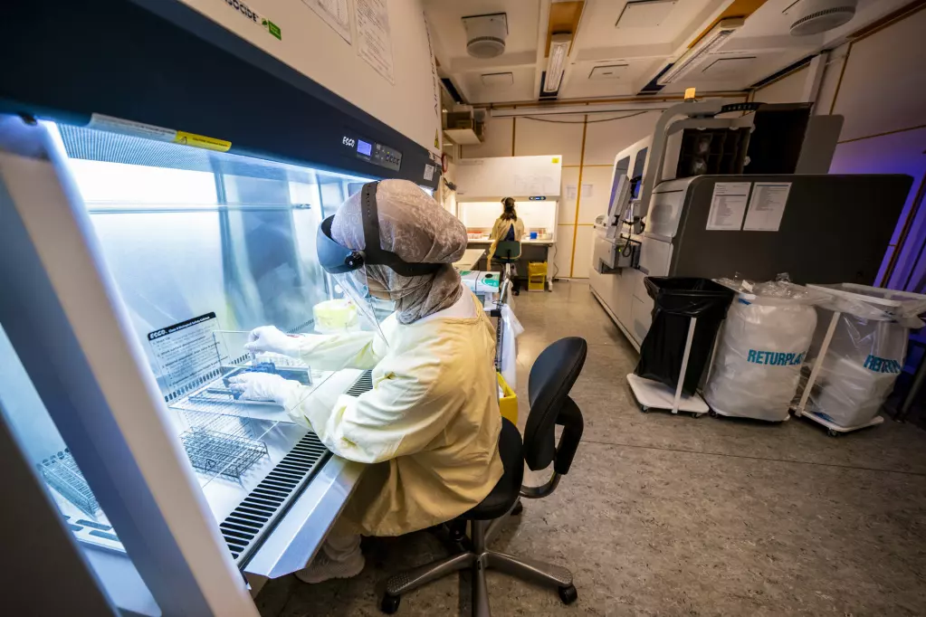Here, a bioengineer tests samples for SARS-CoV-2 in an analysis machine at the clinic for laboratory medicine at Oslo University Hospital Ullevål.