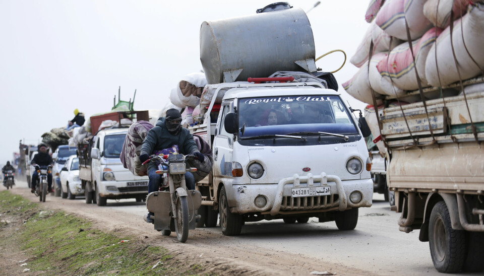 Syrians fleeing the advance of the government forces in the province of Idlib, Syria, towards the Turkish border in January 2020.