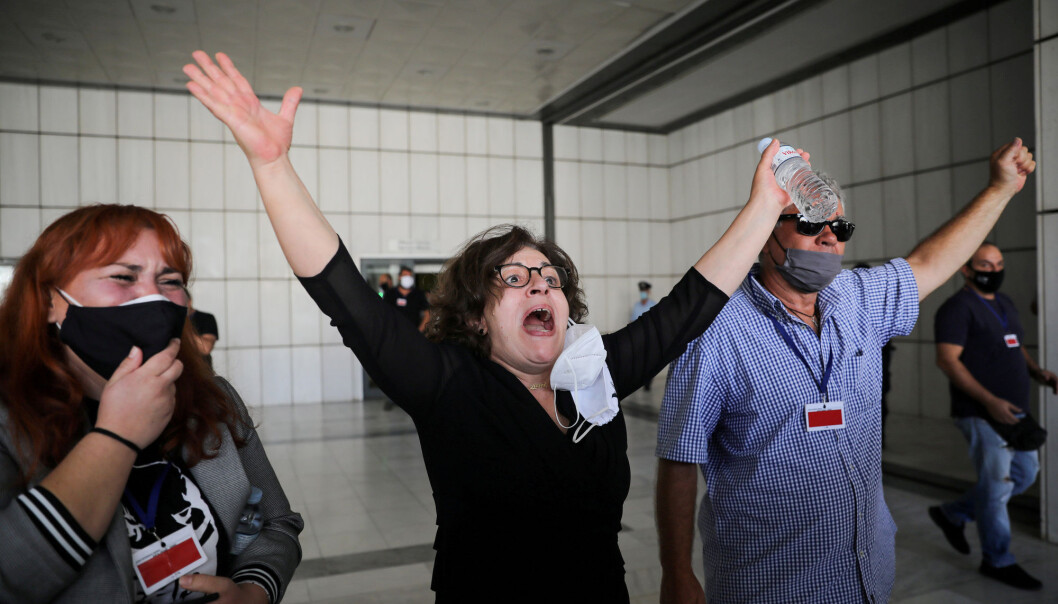 Magda Fyssa mother of anti-racist Greek rapper Pavlos Fyssas, who was killed in 2013 by Golden Dawn supporter Giorgos Roupakias, reacts after a trial of leaders and members of the far-right Golden Dawn party, in Athens, Greece, October 7, 2020. Magda Fyssa mother of anti-racist Greek rapper Pavlos Fyssas, who was killed in 2013 by Golden Dawn supporter Giorgos Roupakias, reacts after a trial of leaders and members of the far-right Golden Dawn party, in Athens, Greece, October 7, 2020.