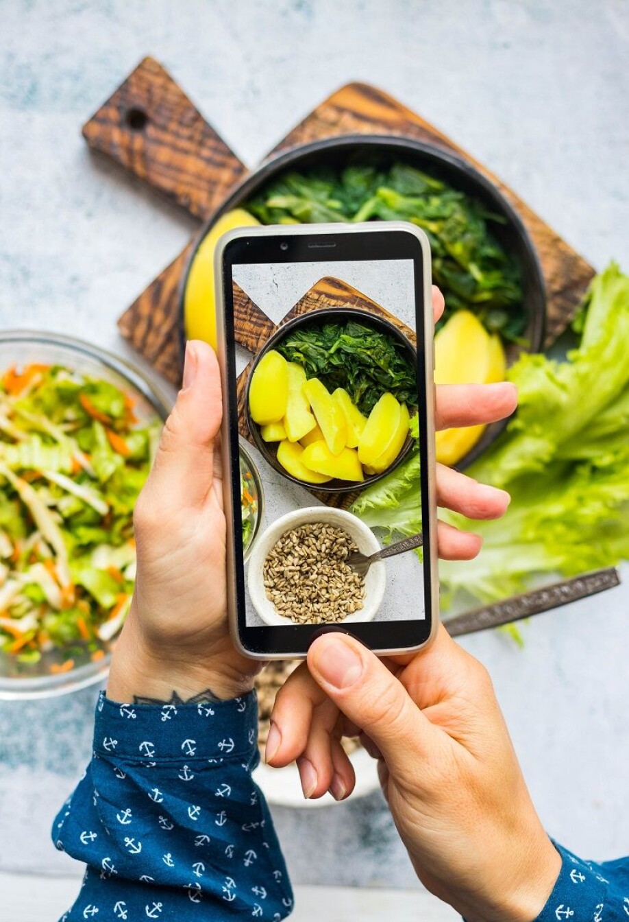 Yes, people do take pictures of their food to post on social media. But they then put their phones away afterwards.