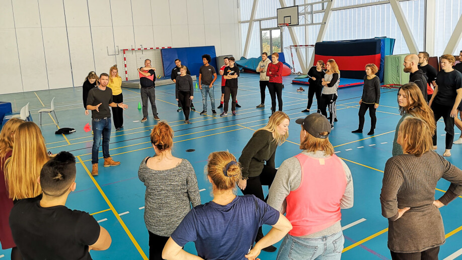 A group of young people learn about learning by movement.
