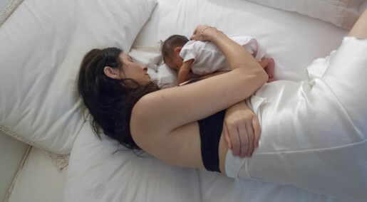 Does lying on your stomach after giving birth help your uterus contract?