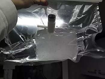 A section of an ice core in a vacuum packed bag ready for melting to analyse for carbonate chemistry and inorganic nutrients