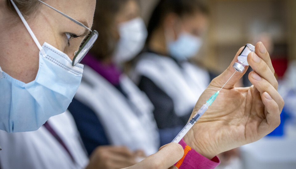 Nurses drawing up Pfizer vaccines at a vaccine centre outside Oslo. As the AztraZeneca vaccine has been paused in Norway, only the two mRNA vaccines from Moderna and Pfizer are in use.