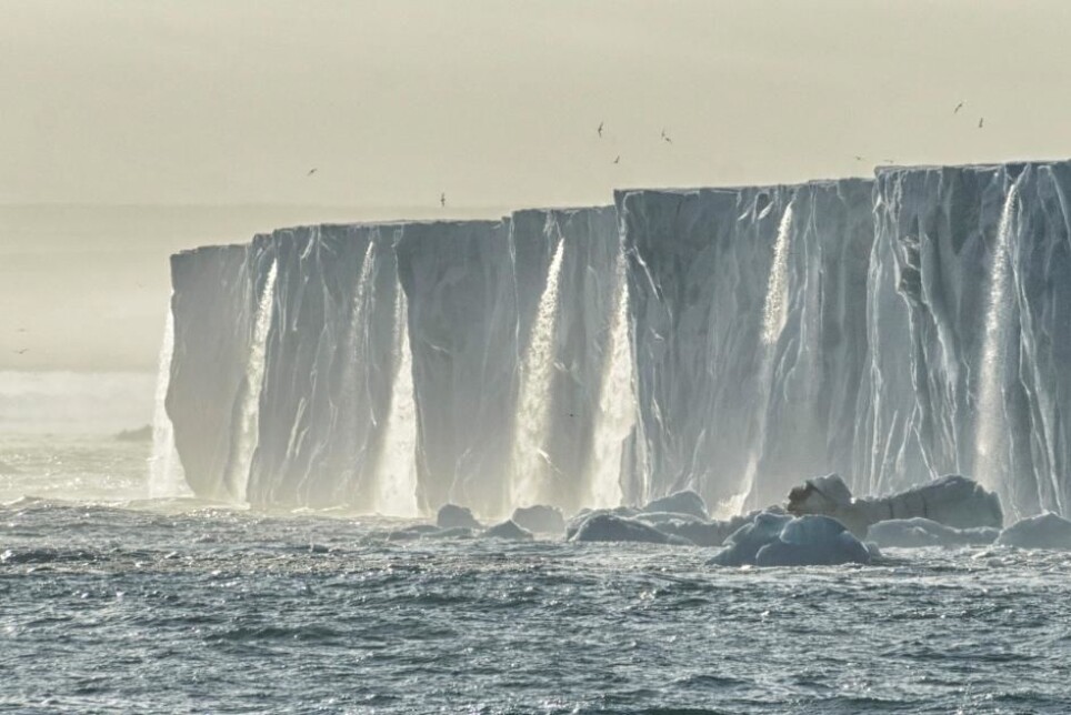 Waterfalls of running meltwater from the Bråsvell glacier on Svalbard.
