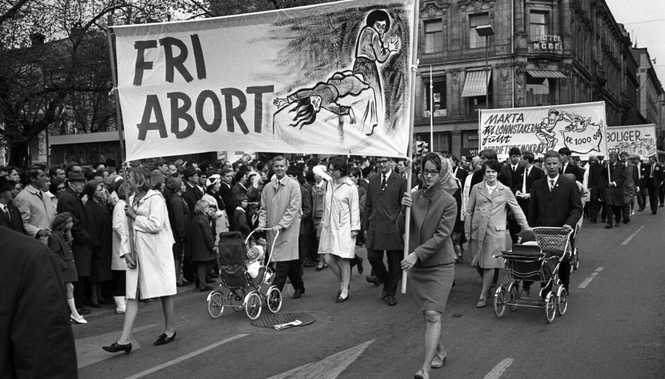 Women's lives and health have long been an important issue for those who wanted to make abortion possible. Here protesters’ poster illustrates what can happen if women aren’t able to have an abortion in a hospital. The May first parade on its way down Karl Johans gate in 1968. Click to add image caption