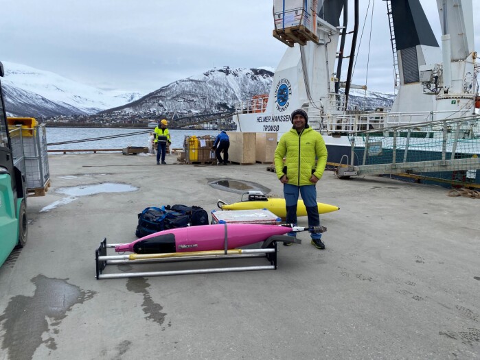 Ahsan Abdi, technician, posing in front of the gliders that'll join the researchers on their expedition. Ahsan Abdi, technician, posing in front of the gliders that'll join the researchers on their expedition.