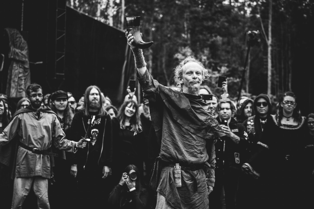 Gustav Holberg from the folk music group Folket Bortafor Nordavinden (the People Beyond the Northwind) holds his drinking horn up high during the opening ceremony of the extreme metal and Viking Age festival Midgardsblot. The festival attracts thousands of people from all over the world annually since 2014. Gustav Holberg from the folk music group Folket Bortafor Nordavinden (the People Beyond the Northwind) holds his drinking horn up high during the opening ceremony of the extreme metal and Viking Age festival Midgardsblot. The festival attracts thousands of people from all over the world annually since 2014.