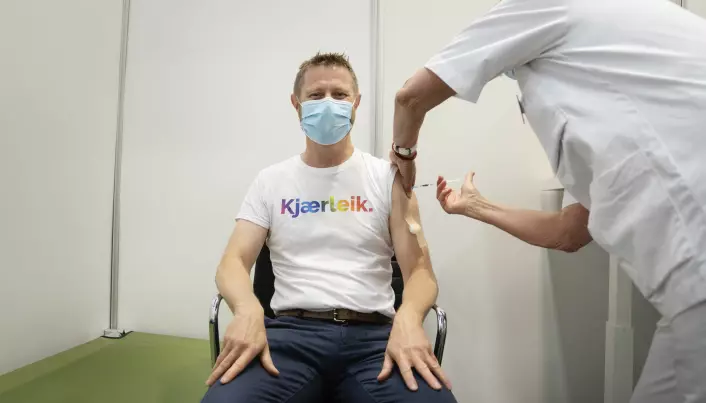 Norwegian Minister of Health Bent Høie receiving his first shot of the Pfizer vaccine earlier this week. The word on his t-shirt, Kjærleik, means love in Norwegian.