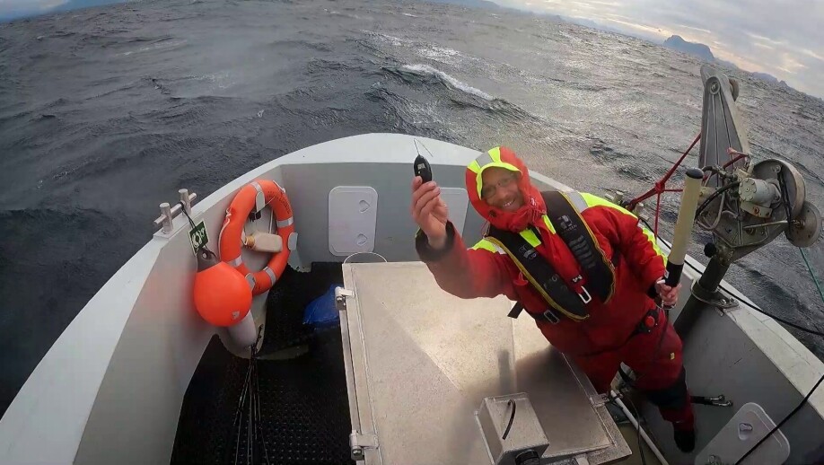 Keno Ferter with the satellite tag. Here outside Florø.