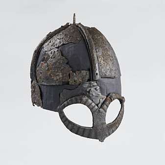 The Gjermundbu helmet. The helmet was deliberately destroyed in connection with the funeral – it was pierced with the spears that lay in the grave, one stab from each. The Gjermundbu helmet. The helmet was deliberately destroyed in connection with the funeral – it was pierced with the spears that lay in the grave, one stab from each.